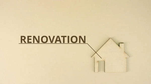 Paperboard house icon with RENOVATION text — Stock Photo, Image