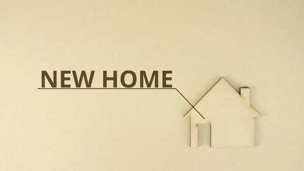 Paperboard house icon with NEW HOME text — Stock Photo, Image