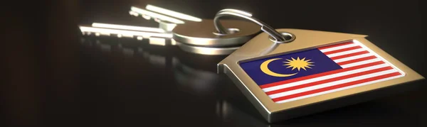 キーチェーンとキーにマレーシアの旗。不動産賃貸または不動産市場の概念、 3Dレンダリング — ストック写真