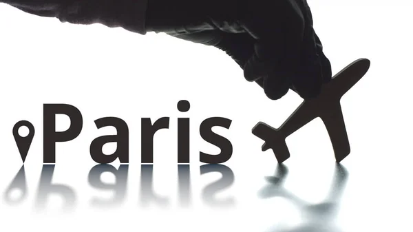 Paris text, geotag and airplane silhouette, air transport concept — Stock Photo, Image