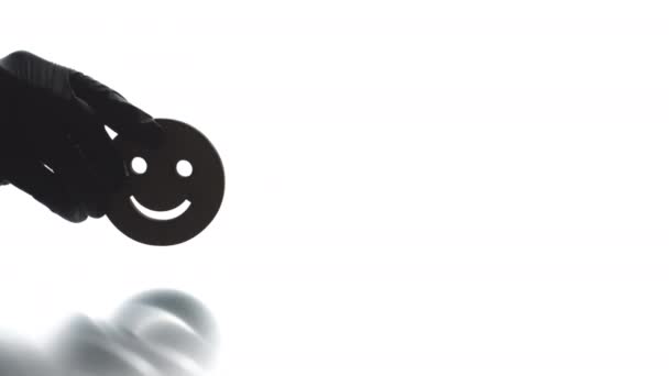 Smiley-Symbol und HAPPINESS-Text auf hellen Hintergrund setzen — Stockvideo