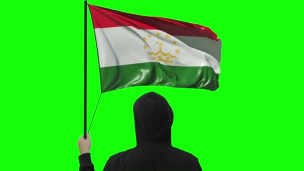 Vlag van Tadzjikistan en onbekende man, alpha matte — Stockvideo
