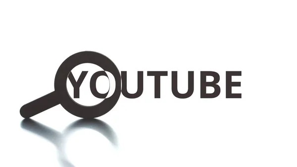 YOUTUBE text pops up from the loupe icon. Editorial conceptal clip — Stock Photo, Image