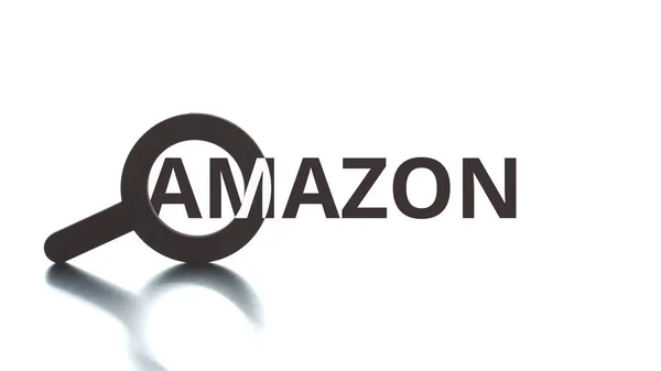 AMAZON tekst verschijnt uit het vergrootglas pictogram, redactionele conceptal clip — Stockfoto