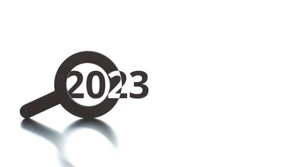 2023-Text erscheint aus dem Lupensymbol — Stockfoto