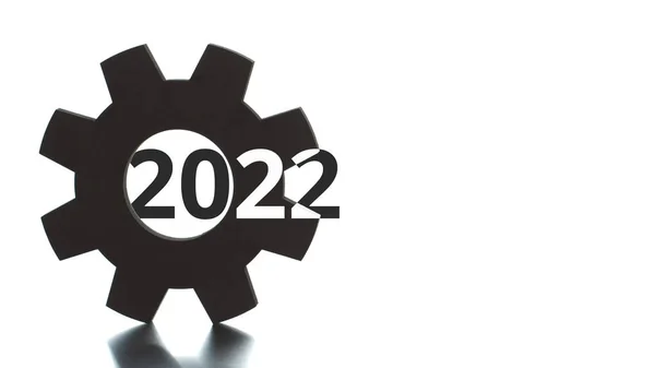 Text von 2022 taucht aus der Zahnradsilhouette auf — Stockfoto