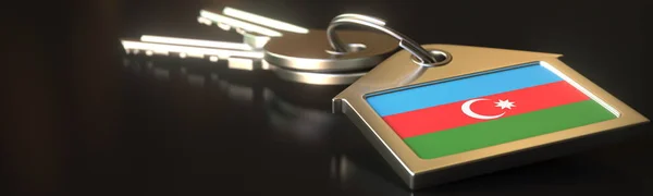 Chaves e porta-chaves da casa com bandeira do Azerbaijão. Conceitos nacionais de arrendamento de imóveis ou mercado imobiliário. Renderização 3d — Fotografia de Stock