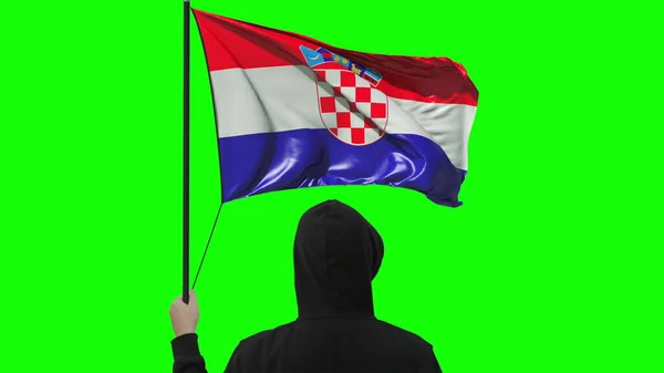 크로아티아의 깃발과 알려 지지 않은 사람, 녹색 배경에 고립 — 스톡 사진