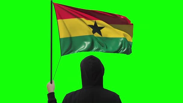 Waving flag of Ghana and unknown man wearing black, alpha matte — Stock Video