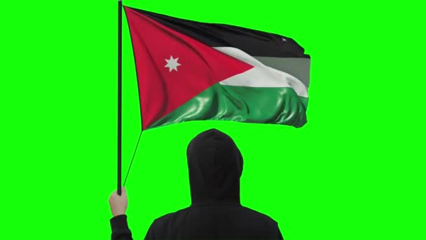Waving flag of Jordan and unknown man wearing black, alpha matte — Stock Video