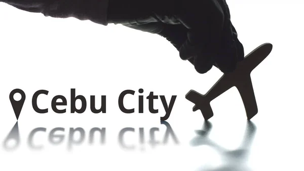 Cebu City text, geotag and airplane silhouette, air transport concept — Stock Photo, Image
