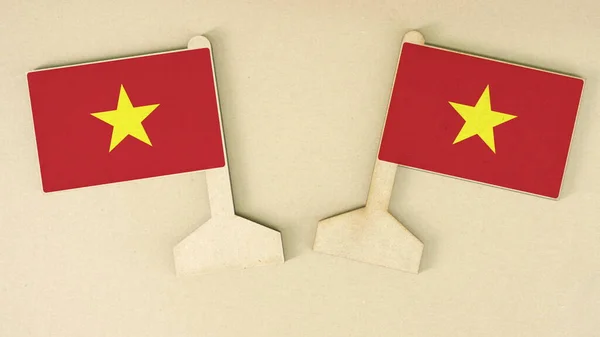Flags of Vietnam made of recycled paper on the cardboard desk, flat layout — Stock Photo, Image