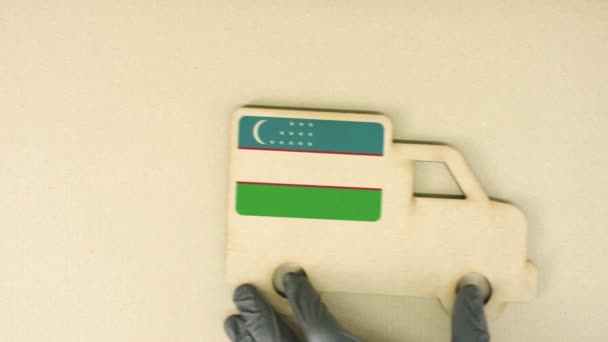 Ikona ciężarówki z recykling z flagą Uzbekistanu. Krajowa koncepcja zrównoważonego transportu lub dostawy — Wideo stockowe