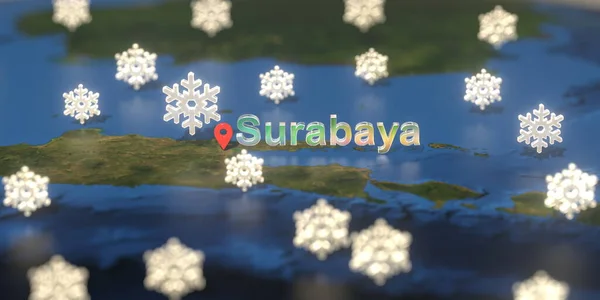 Ícones do tempo nevado perto de Surabaya cidade no mapa, previsão do tempo relacionados renderização 3D — Fotografia de Stock