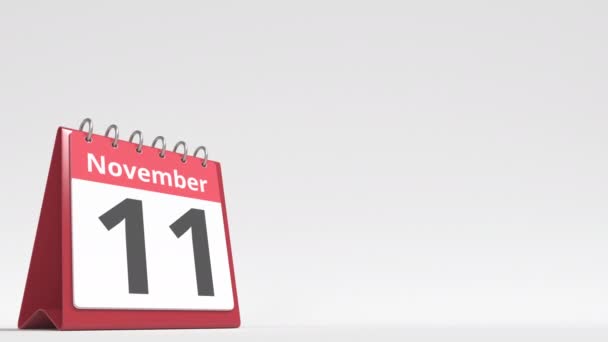 12 листопада на сторінці календаря столів, порожній простір для тексту користувача, 3d анімація — стокове відео