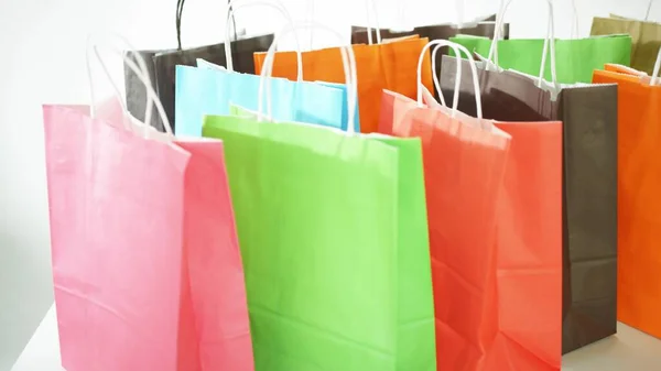 Many color paper bags, shopping concept — Fotografia de Stock