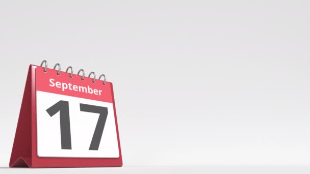 18 вересня дата на сторінці календаря стола, порожній простір для тексту користувача, 3d анімація — стокове відео