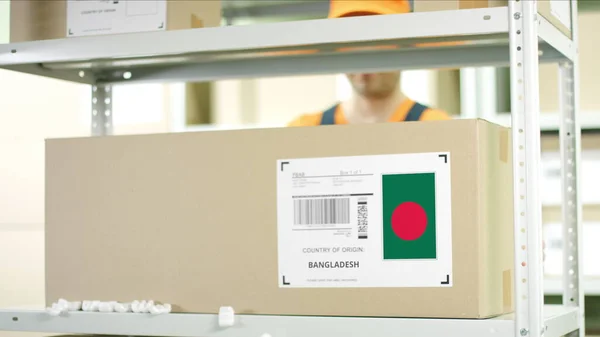 Box with goods from Bangladesh in a warehouse — Stock Photo, Image