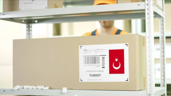 Box with goods from Turkey in a warehouse — Stock Photo, Image