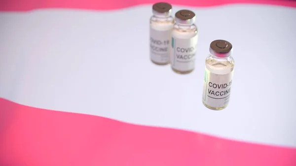 COVID-19 vacuna y bandera de Austria —  Fotos de Stock