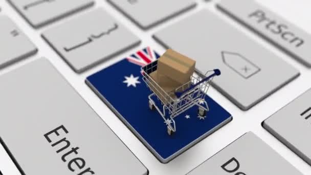 Teclado con bandera de Australia y carrito de compras con cajas. Compras en línea relacionadas looping animación 3d — Vídeo de stock