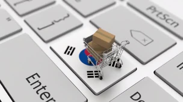한국 국기가 달린 키보드와 상자가 있는 쇼핑 카트. Online shopping related looping 3d animation — 비디오