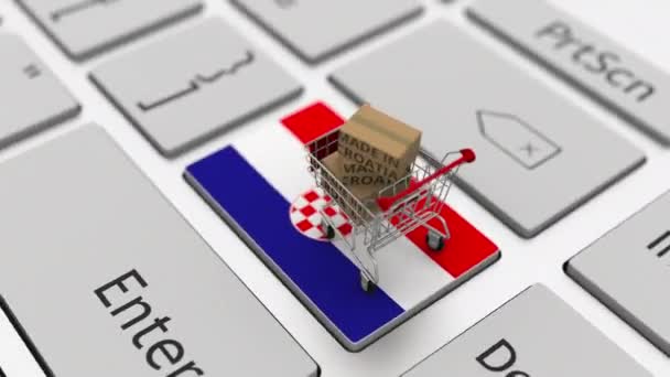 Κουτιά με κείμενο MADE IN CROATIA και καλάθι αγορών στο πληκτρολόγιο. Εννοιολογική looping 3d animation — Αρχείο Βίντεο