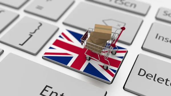 Nákupní košík na klávesnici s vlajkou Velké Británie. 3D vykreslování související s elektronickým obchodem — Stock fotografie