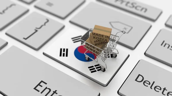 Boxen mit MADE IN KOREA Text und Warenkorb auf der Tastatur. Konzeptionelles 3D-Rendering — Stockfoto