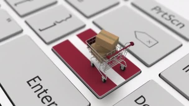 Shopping cart on the keyboard key with flag of Latvia. Looping ecommerce related 3d animation — Stock Video