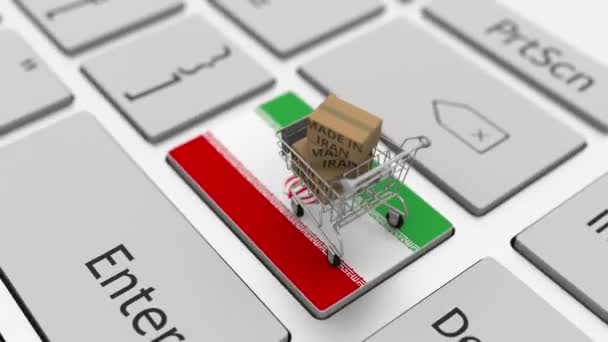 Goederen gemaakt in Iran in het winkelwagentje op het toetsenbord. Export of import concepten, looping 3d animatie — Stockvideo