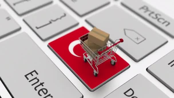 Tastiera per computer con bandiera della Turchia e carrello con cartoni, loop di shopping online concettuale animazione 3d — Video Stock