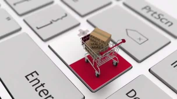 Goods made in Malta in the shopping cart on the keyboard. Export or import concepts, looping 3d animation — Stock Video