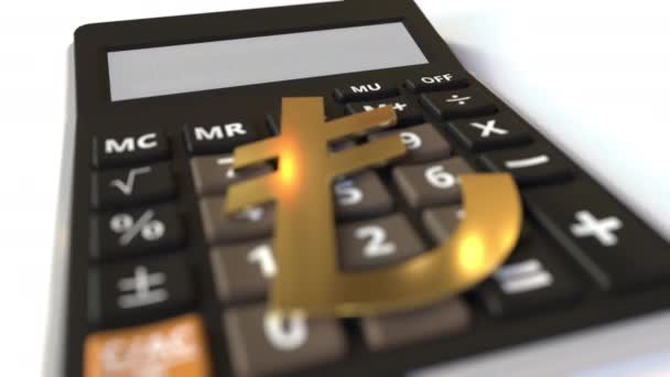 LOAN tekst na wyświetlaczu kalkulatora i symbol waluty lira. Animacja konceptualna 3d — Wideo stockowe
