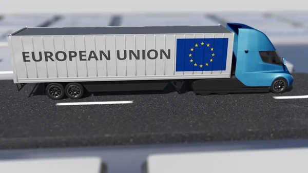 Bandeira da União Europeia no camião em movimento e no teclado do computador. Transporte internacional relacionado com a renderização 3d — Fotografia de Stock