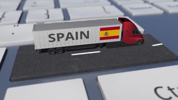 Vlajka Španělska na pohybující se kamionu a počítačové klávesnici. Mezinárodní expedice související smyčka 3D animace — Stock video