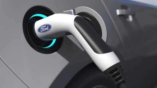 Ηλεκτρικό βύσμα αυτοκινήτου με λογότυπο FORD σε αυτό. Έκδοση εννοιολογική 3D animation — Αρχείο Βίντεο