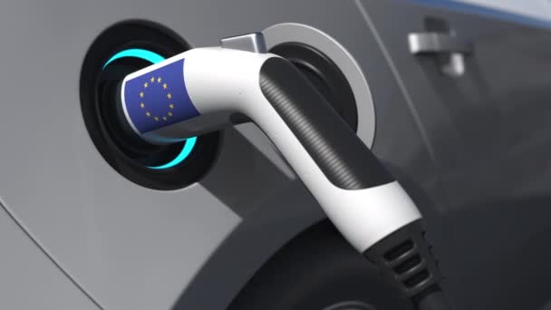 Az Európai Unió lobogója alatt közlekedő elektromos autó töltőcsatlakozója. Fogalmi 3D animáció — Stock videók