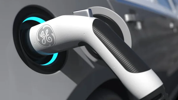Зарядка электророзетки автомобиля с логотипом GENERAL ELECTRIC на ней. Редакционная концептуальная 3D рендеринг — стоковое фото