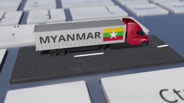 Caminhão com bandeira de Myanmar move-se na tecla do teclado. Exportação ou importação relacionados looping 3d animação — Vídeo de Stock