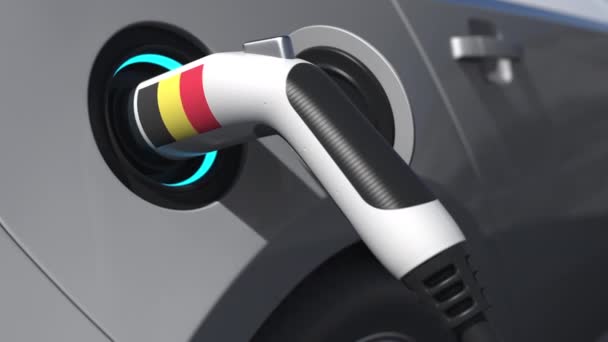 Flagge Belgiens auf dem Ladestecker eines Elektroautos. Konzeptionelle 3D-Animation — Stockvideo