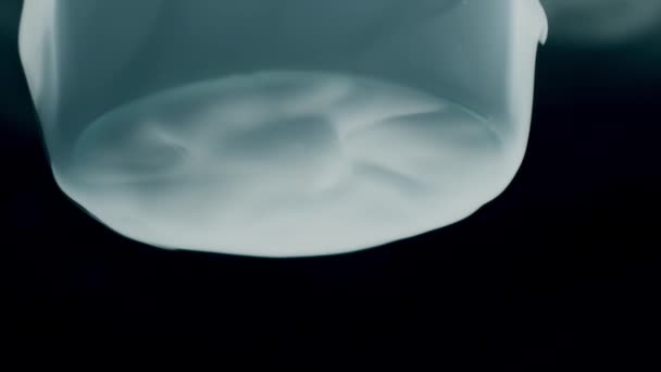 Cold dry ice or frozen carbon dioxide steam on dark background, slow motion shot — Stock Video