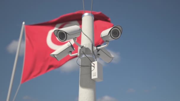 Udendørs overvågningskameraer på stangen nær Tunesiens flag. Looping 3d animation – Stock-video