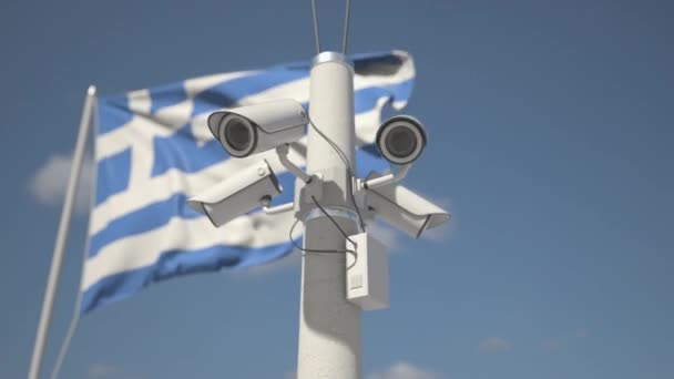 Waving flag of Greece and the security cameras on the pole. Looping 3d animation — Stockvideo