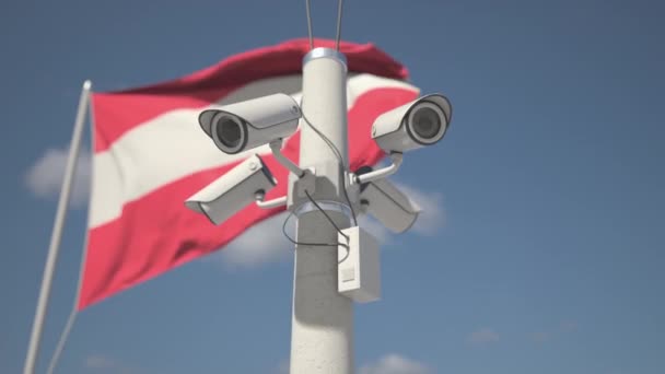 Viftar med Österrikes flagga och övervakningskamerorna på stolpen. Looping av 3D-animation — Stockvideo