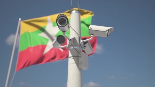Acenando bandeira de Mianmar e as câmeras de segurança no poste. Looping animação 3d — Vídeo de Stock