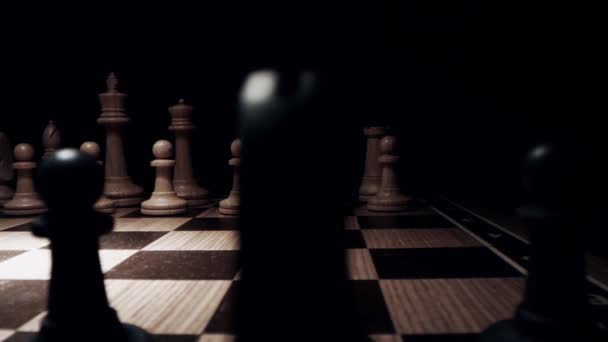 Chess players make first moves of pawns. Macro dolly shot — Wideo stockowe