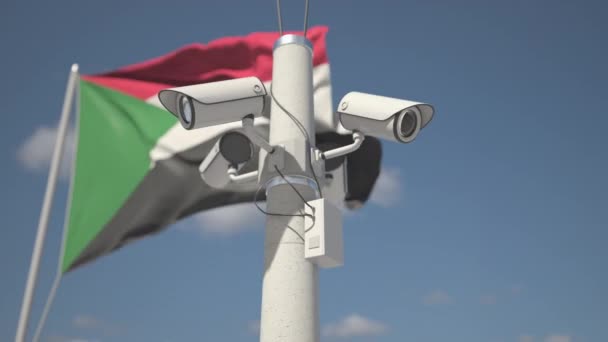 Säkerhetskameror på stolpen nära Sudans flagga, looping 3D-animation — Stockvideo