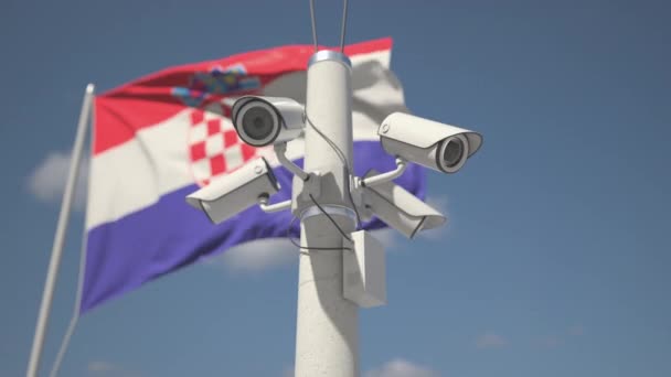 Acenando bandeira da Croácia e as câmeras de segurança no pólo. Looping animação 3d — Vídeo de Stock