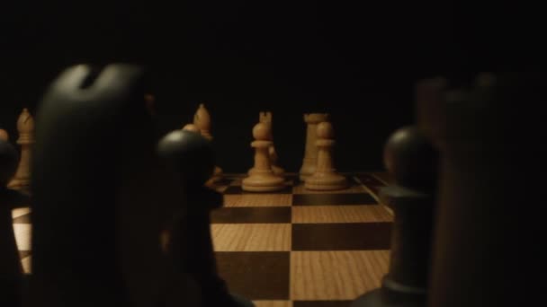 First moves of pawns on the chessboard. Macro dolly shot — Stock Video